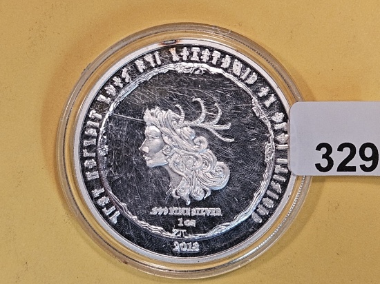 One Troy ounce .999 fine silver art proof round