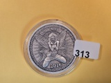 One Troy ounce .999 fine silver Art round