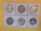 Six mixed silver Franklin Half Dollars