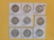 Nine mixed silver Walking Liberty Half Dollars