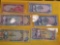 Eight Crisp Uncirculated pieces of currency from Jamaica