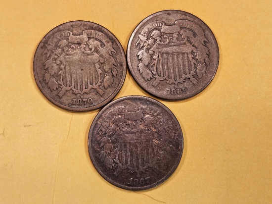 Three 2-cent pieces in Very Good