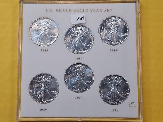 Six GEM Brilliant Uncirculated American Silver Eagles in Capitol Plastic US Silver Eagle Year Set
