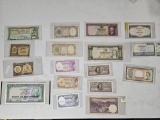 Eighteen mixed pieces of world currency