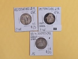 Three mixed silver quarters