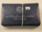 Ten Mixed Date Uncirculated Eisenhower Silver Dollars
