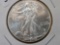 And last but not least a GEM BU 2002 American Silver Eagle
