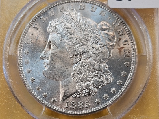 PCGS 1885 Morgan Silver Dollar in Mint State 63