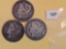 Three mixed Morgan Silver Dollars