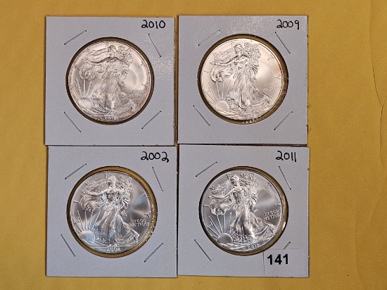 Four GEM Brilliant Uncirculated American Silver Eagles