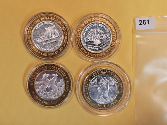 Four Silver center Ten Dollar Casino Gaming Tokens