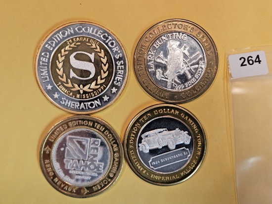 Four Silver center Ten Dollar Casino Gaming Tokens