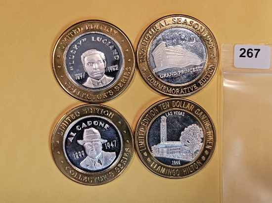 Four Silver center Ten Dollar Casino Gaming Tokens