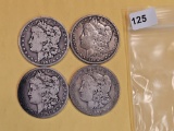 Four mixed Morgan Silver Dollars