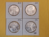 Four GEM Brilliant Uncirculated American Silver Eagles