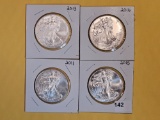 Four GEM Brilliant Uncirculated American Silver Eagles
