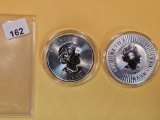 Two GEM Brilliant Uncirculated Silver Coins