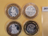 Four Silver center Ten Dollar Casino Gaming Tokens