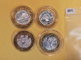 Four Silver center Ten Dollar Casino Gaming Tokens
