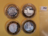 Four Silver center Ten Dollar Casino Gaming Tokens