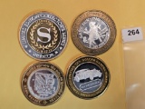 Four Silver center Ten Dollar Casino Gaming Tokens