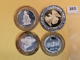 Four Silver center Ten Dollar Casino Gaming Tokens