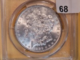 PCGS 1886 Morgan Dollar in Mint State 63
