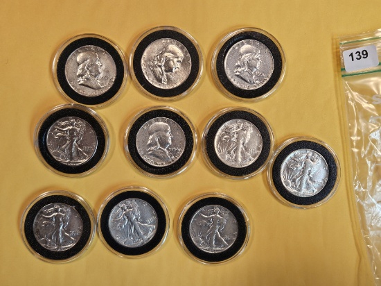 Ten mixed silver Half Dollars