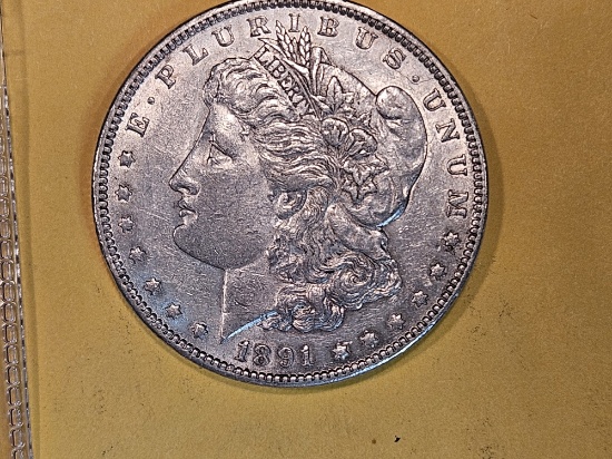 1891 Morgan Dollar in About Uncirculated plus