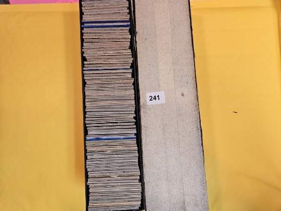 Full, single-row Stock box of mixed World coins