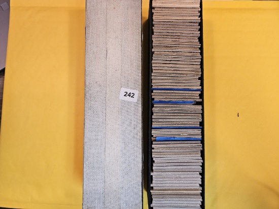 Full, single-row Stock box of mixed World coins