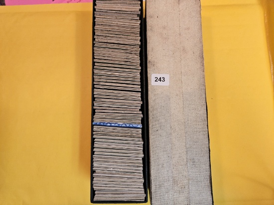 Full, single-row Stock box of mixed World coins