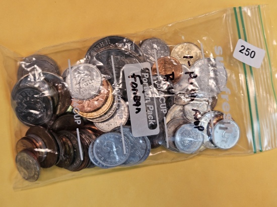 Little over ONE Pound of mixed World Brilliant Uncirculated Coins
