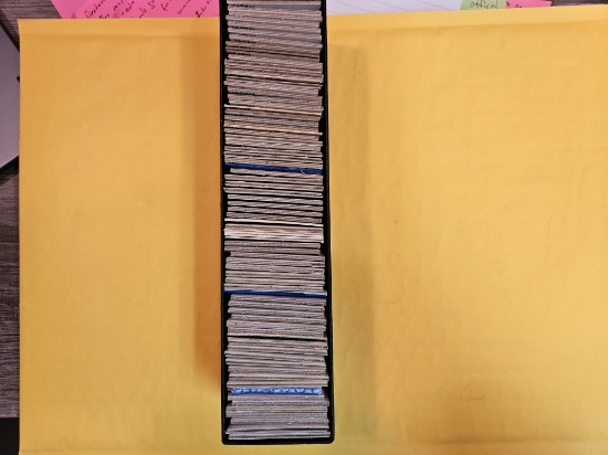 Full, single-row Stock box of mixed World coins