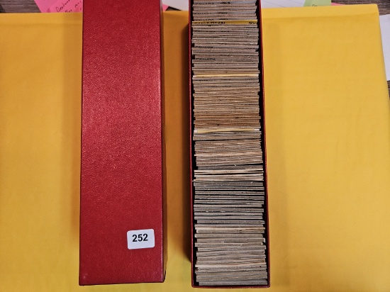 Full, single-row Stock box of mixed World coins