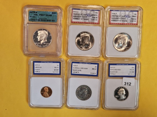 Six mixed coins in holders