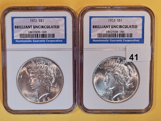 NGC 1922 and 1923 silver Peace Dollars