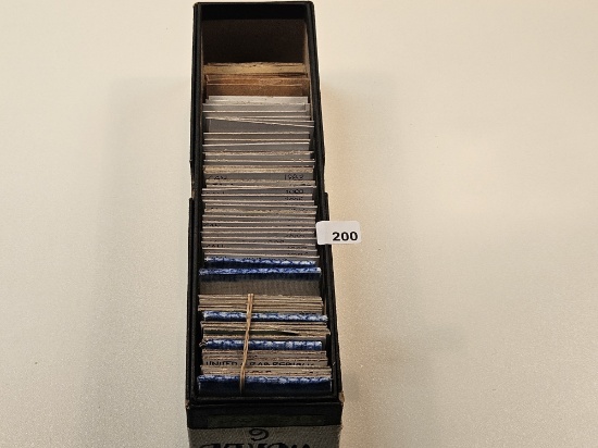 Single-Row Stock box full of mixed World Coins