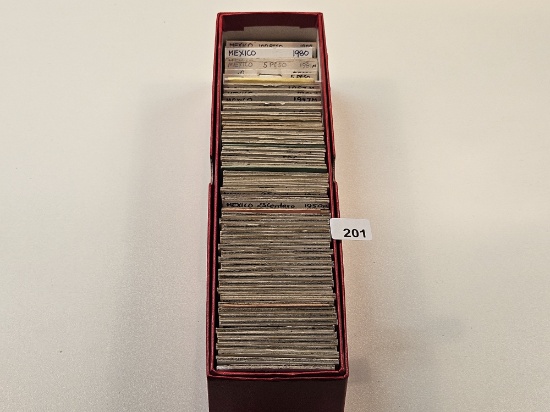Single-Row Stock box full of mixed World Coins