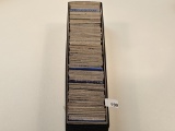 Single-Row Stock box full of mixed World Coins