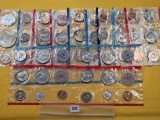 Two 1963 Silver US Mint Sets and Nine Mixed Uncirculated Coin Set Sleeves