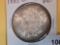 Choice Brilliant Uncirculated 1885-O Morgan Dollar
