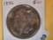 Cool Uncirculated 1885 Morgan Dollar with toning