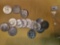 Sixteen mixed silver Kennedy Half Dollars