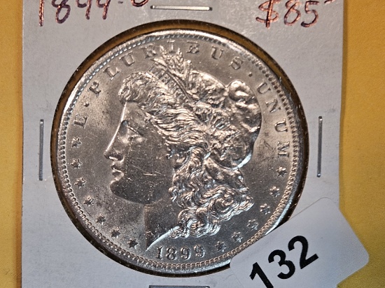 Choice Brilliant Uncirculated Plus - details 1899-O Morgan Dollar