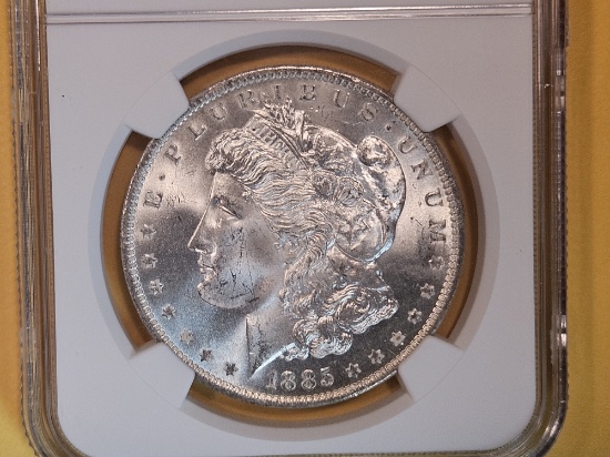 NGC 1885-O Morgan Dollar in Mint State 63