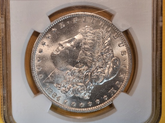 NGC 1884-O Morgan Dollar in Mint State 63