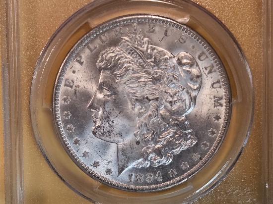 PCGS 1884-O Morgan Dollar in Mint State 63