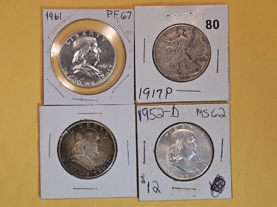Four mixed silver half dollars