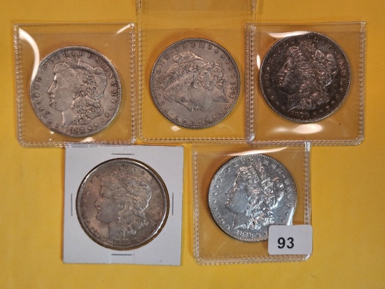 Five mixed Morgan Silver Dollars